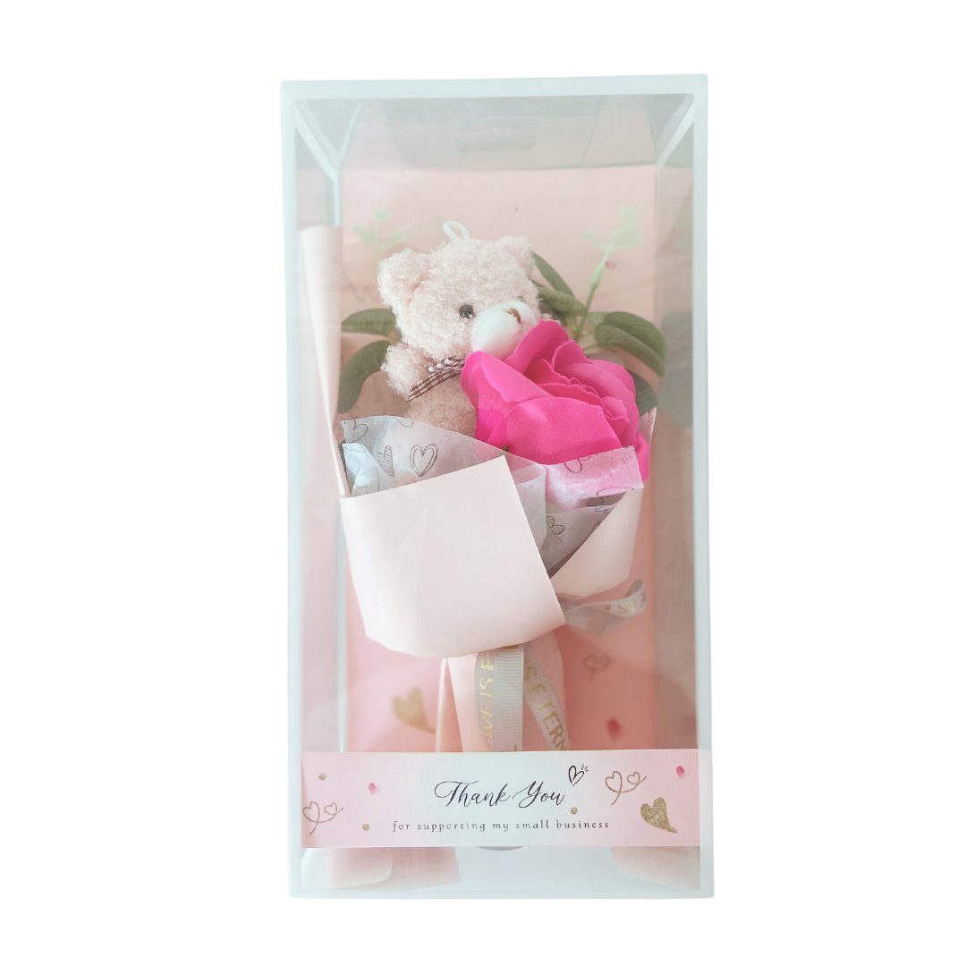 Ramo de oso de peluche con rosa en caja